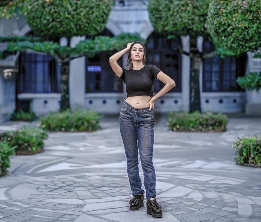 Fashion editorial photograph with dramatic shadows