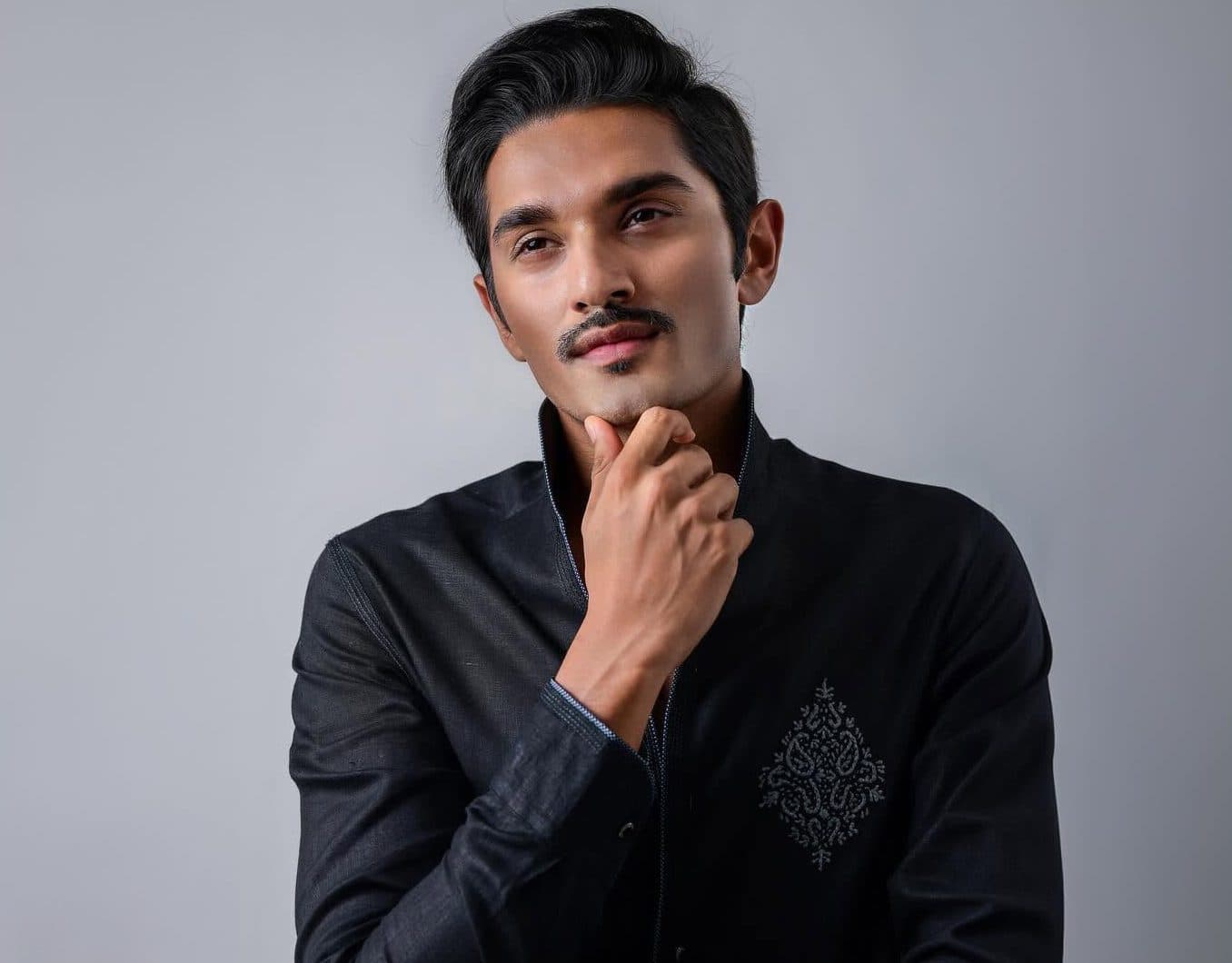 Professional headshot with polished studio lighting
